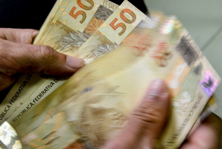 Caixa paga novo Bolsa Família a beneficiários com NIS de final 4